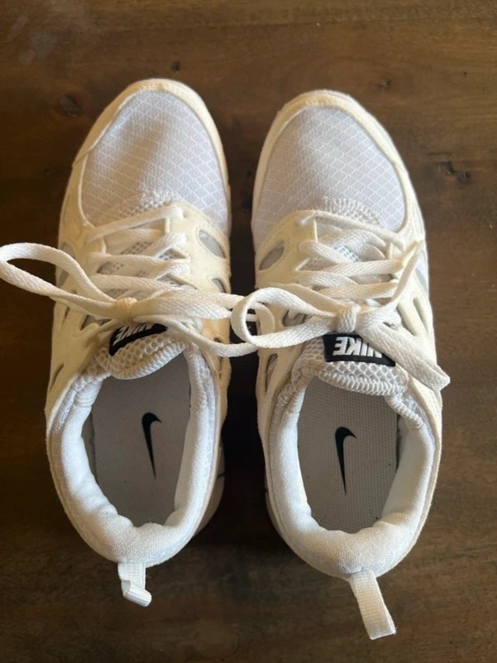 Nike White Sneakers with Black Swoosh